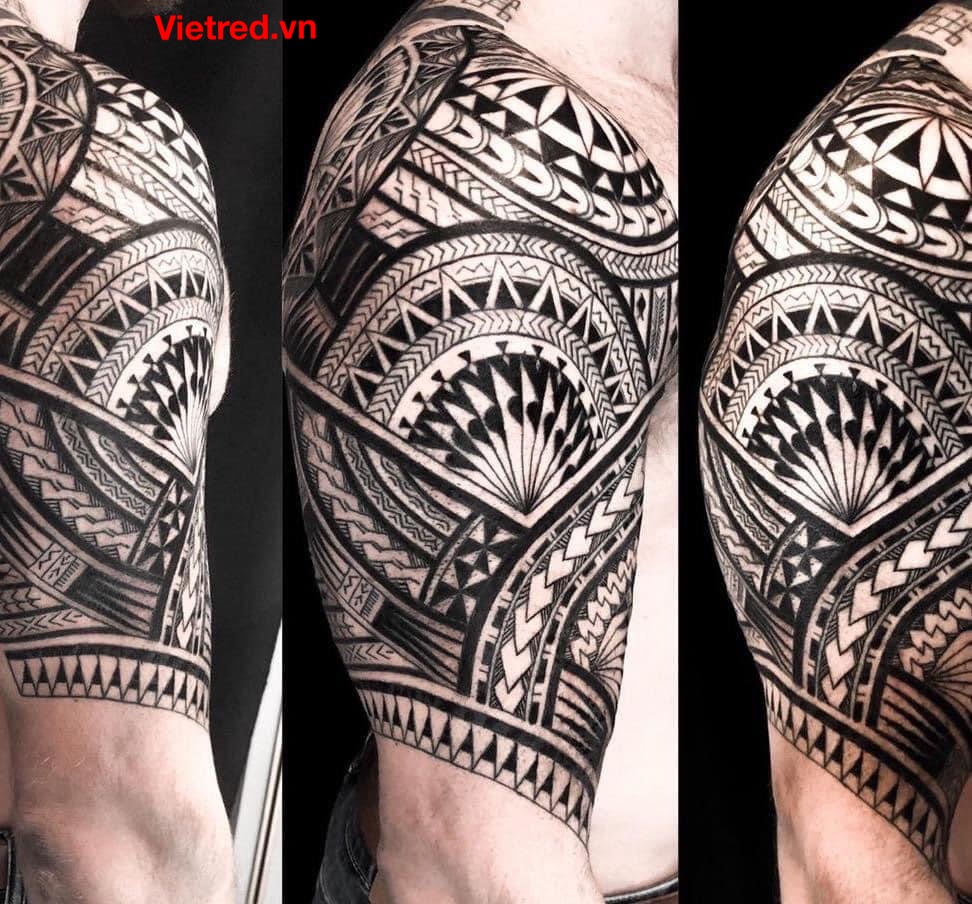 Hình xăm maori ở tay và cánh tay qua một bên ngực đẹp chất