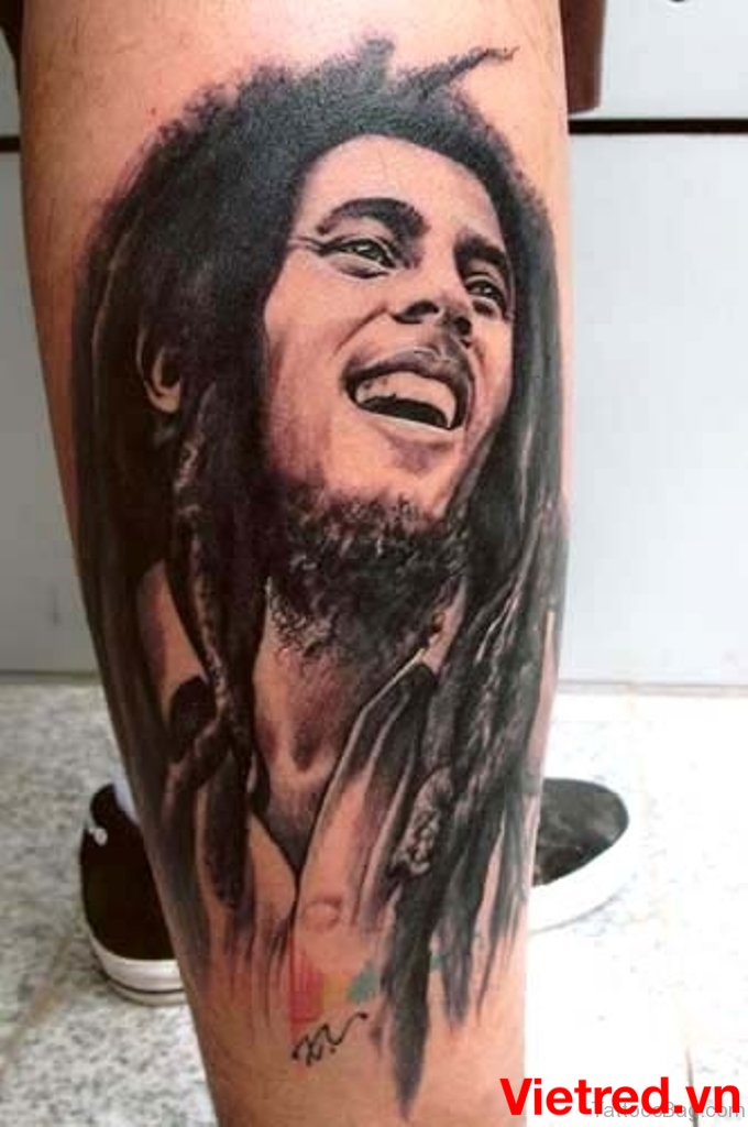 Hình xăm chân dung Bob Marley Black Ink trên chân